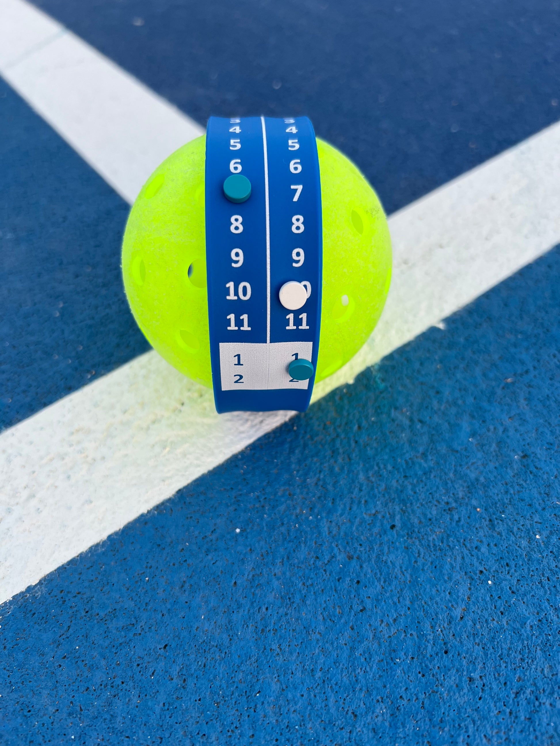 Pickleball Point Bands are the best pickleball scorekeeper, scoring band and scoreband worn on your wrist to keep score and track the server number while playing pickleball